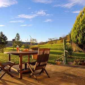 Table garden view, house sitting, France